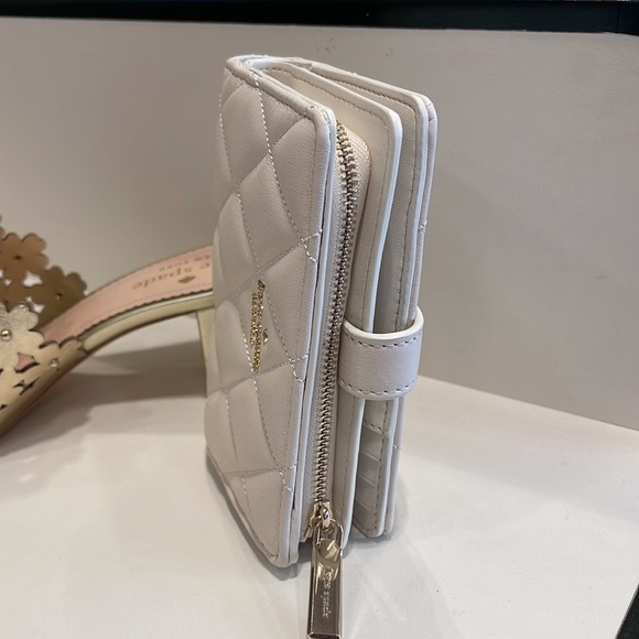 Kate Spade Carey Medium Compartment Bifold Wallet 
COLOR: Parchment - Picture 10 of 16